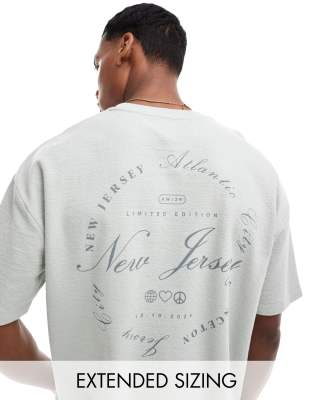 Asos Design Oversized T-shirt With Front Pocket And City Back Print In Neutral