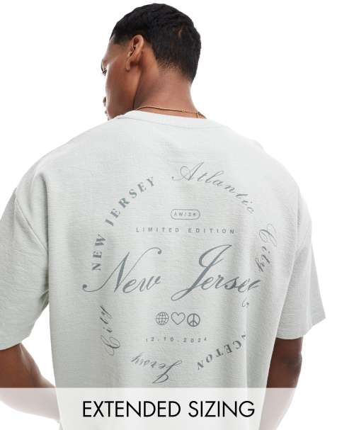 ASOS DESIGN oversized t-shirt with front pocket and city back print in grey - view 1