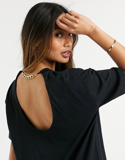 ASOS DESIGN oversized t-shirt with gold chunky chain back detail in black