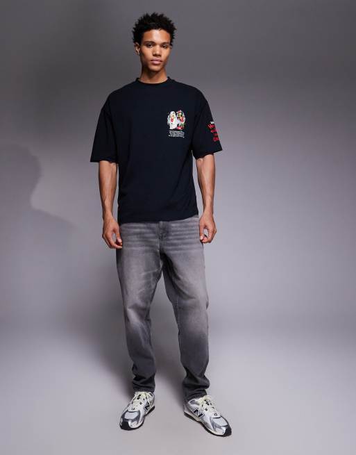 ASOS DESIGN oversized t-shirt with Grinch prints in black | ASOS