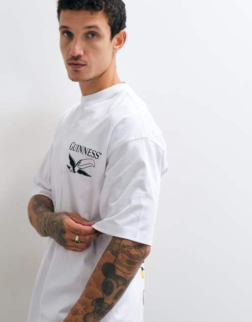 ASOS DESIGN Oversized t-shirt with Guinness Christmas Print in White, 5 of 5
