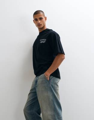 Asos Design Oversized T-shirt With Guinness Multi Back Print In Black