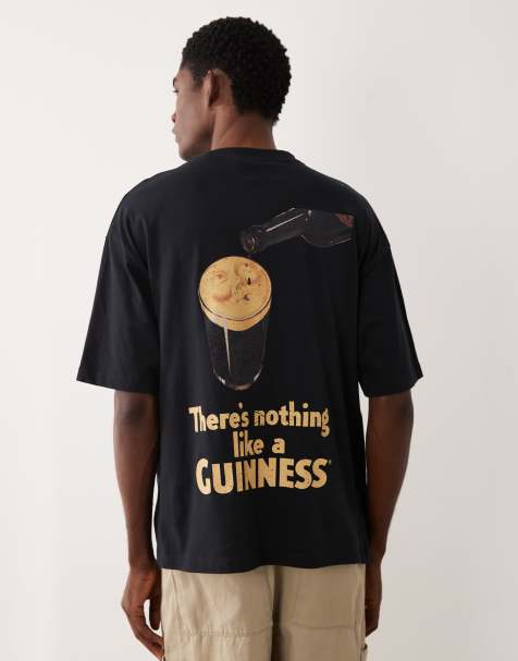 ASOS DESIGN oversized t-shirt with Guinness print in black - view 1