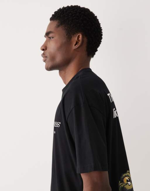 ASOS DESIGN oversized t-shirt with Guinness print in black, 4 of 5