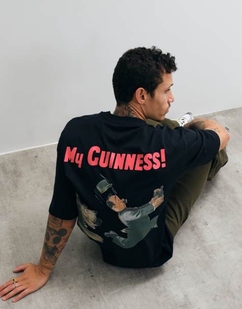 ASOS DESIGN oversized t-shirt with Guinness print in Black - view 1