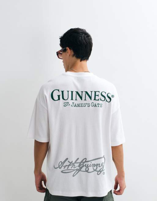 ASOS DESIGN Oversized t-shirt with Guinness print in Black, 3 of 5