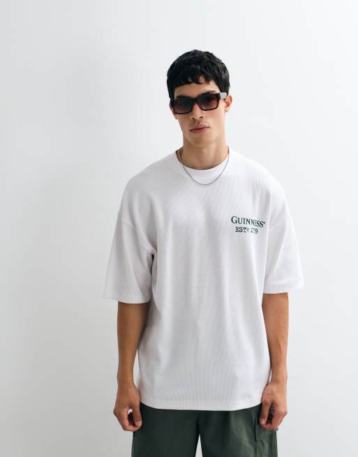 ASOS DESIGN Oversized t-shirt with Guinness print in Black, 4 of 5