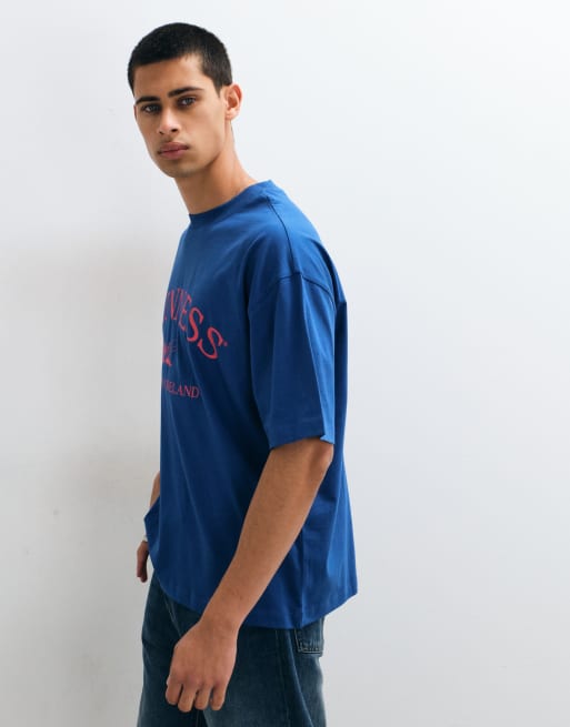 ASOS DESIGN oversized t-shirt with Guinness print in Navy, 4 of 5