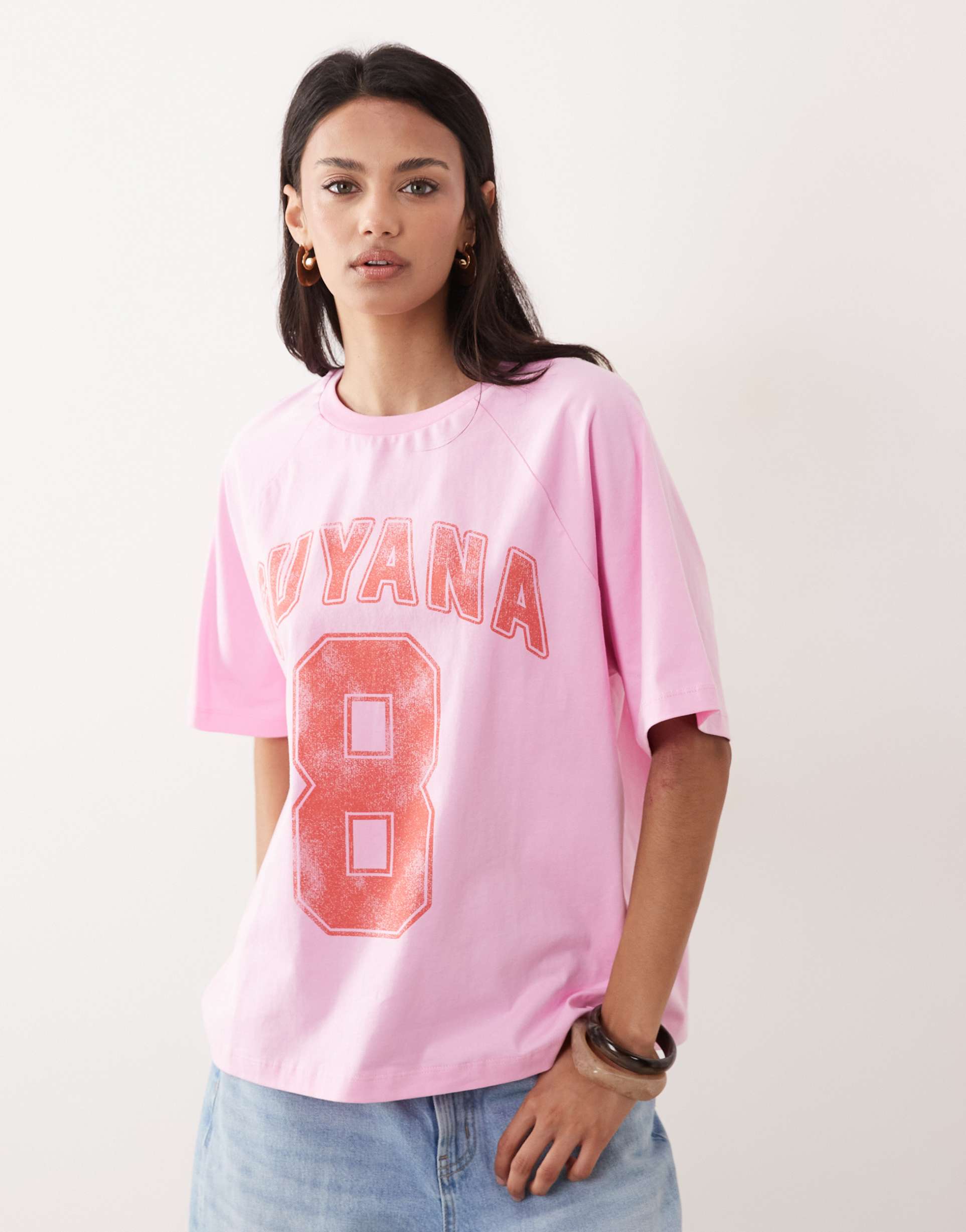 asos design oversized t-shirt with guyana varsity graphic in pink and red