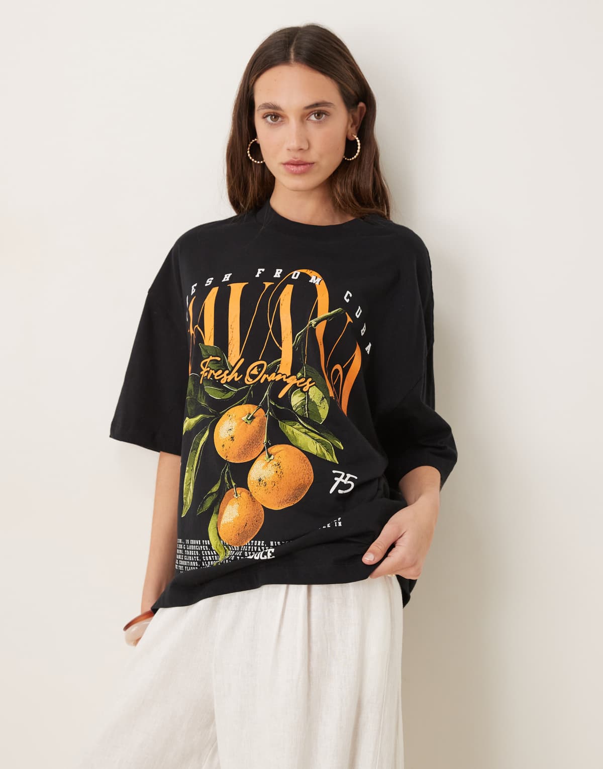 ASOS DESIGN oversized t-shirt with havana orange graphic in black