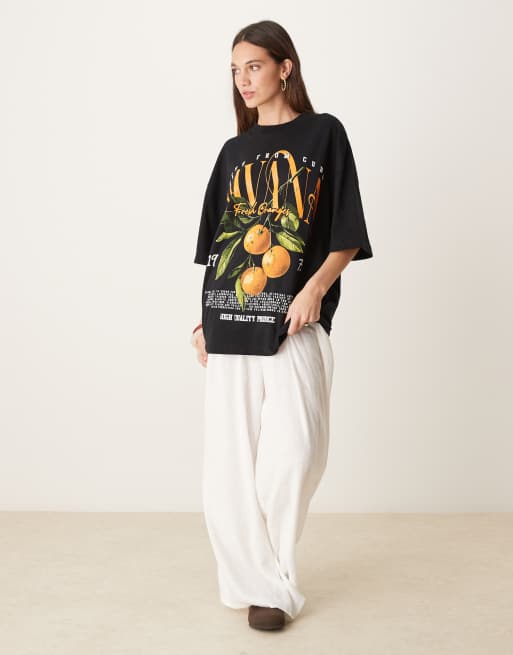 ASOS DESIGN oversized t-shirt with havana orange graphic in black