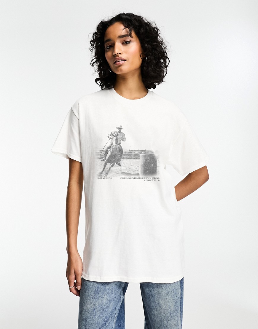 ASOS DESIGN oversized t-shirt with horseback riding cow boy graphic in white