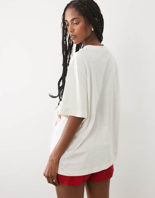 ASOS DESIGN oversized t-shirt with in to the wild leopard graphic in cream, 3 of 4