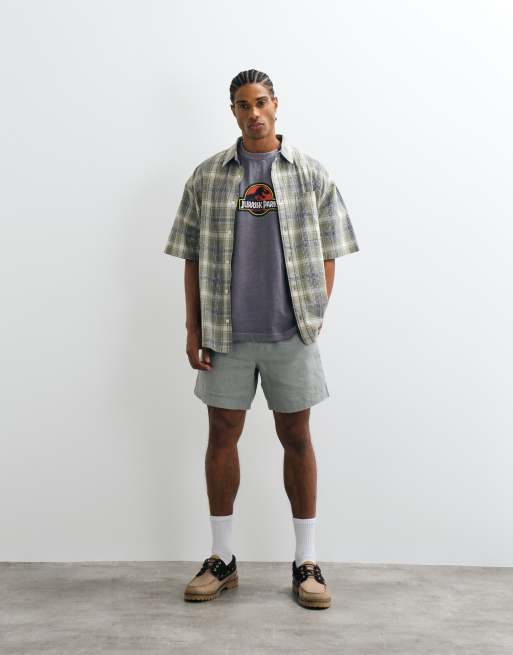 ASOS DESIGN oversized t-shirt with Jurassic Park T-Rex print in washed black, 3 of 5