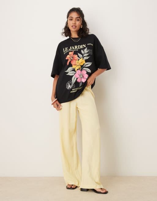 ASOS DESIGN oversized T-shirt with le jardin floral graphic in black