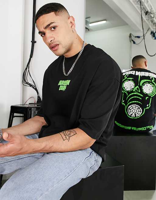 ASOS DESIGN oversized t-shirt with neon Green Day back print ASOS DESIGN oversized t-shirt with neon Green Day back print