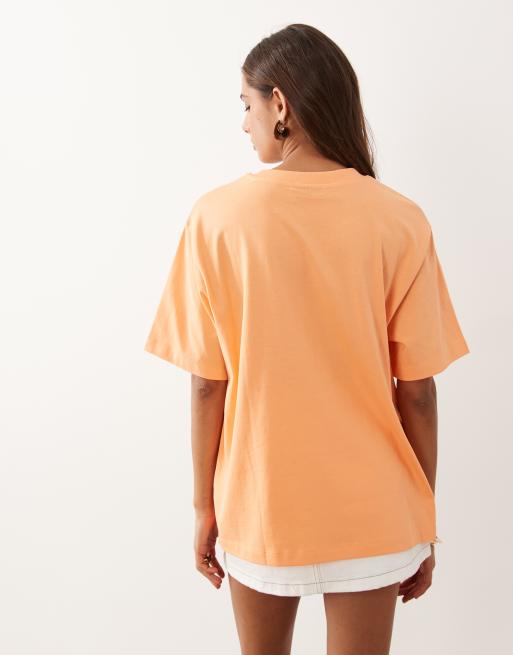 ASOS DESIGN Oversized T-shirt with neon shell graphic in coral, 3 of 4