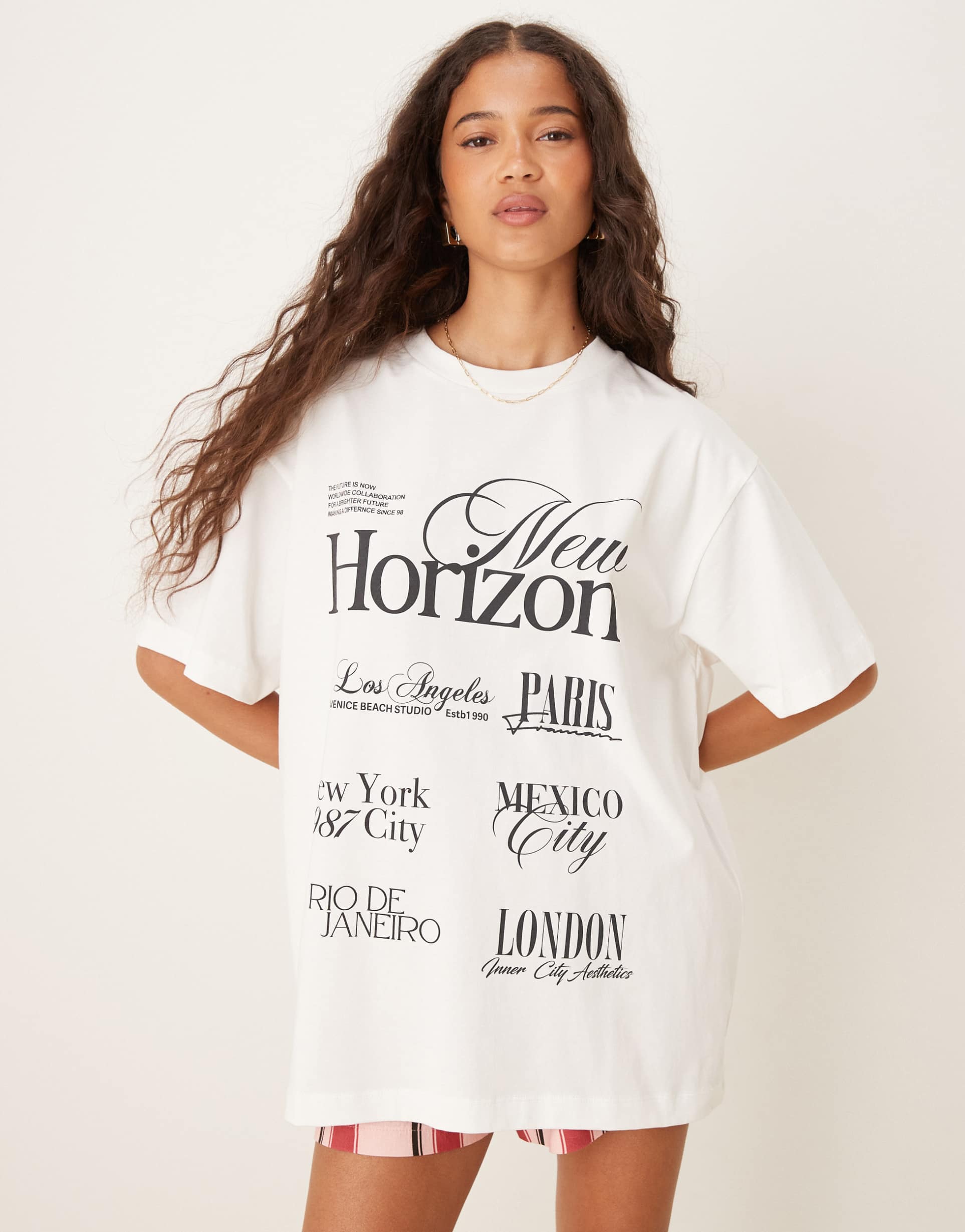 asos design oversized t-shirt with new horizon text graphic in cream