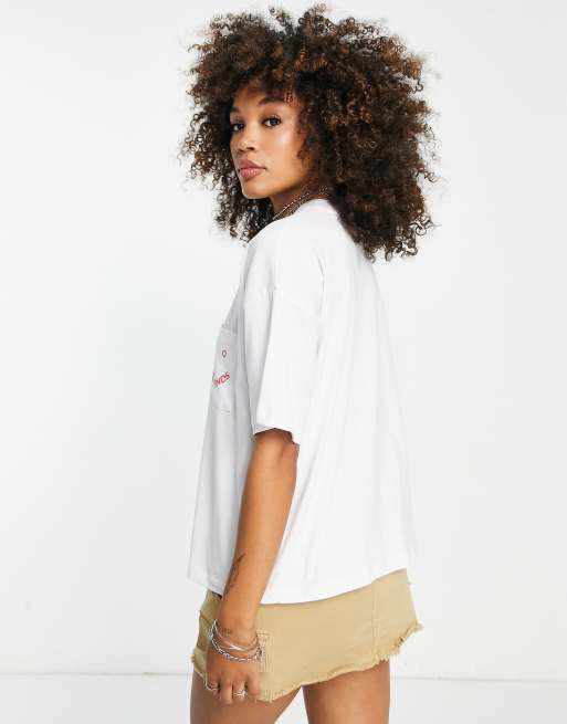 ASOS DESIGN oversized t shirt with no fake friends graphic pocket