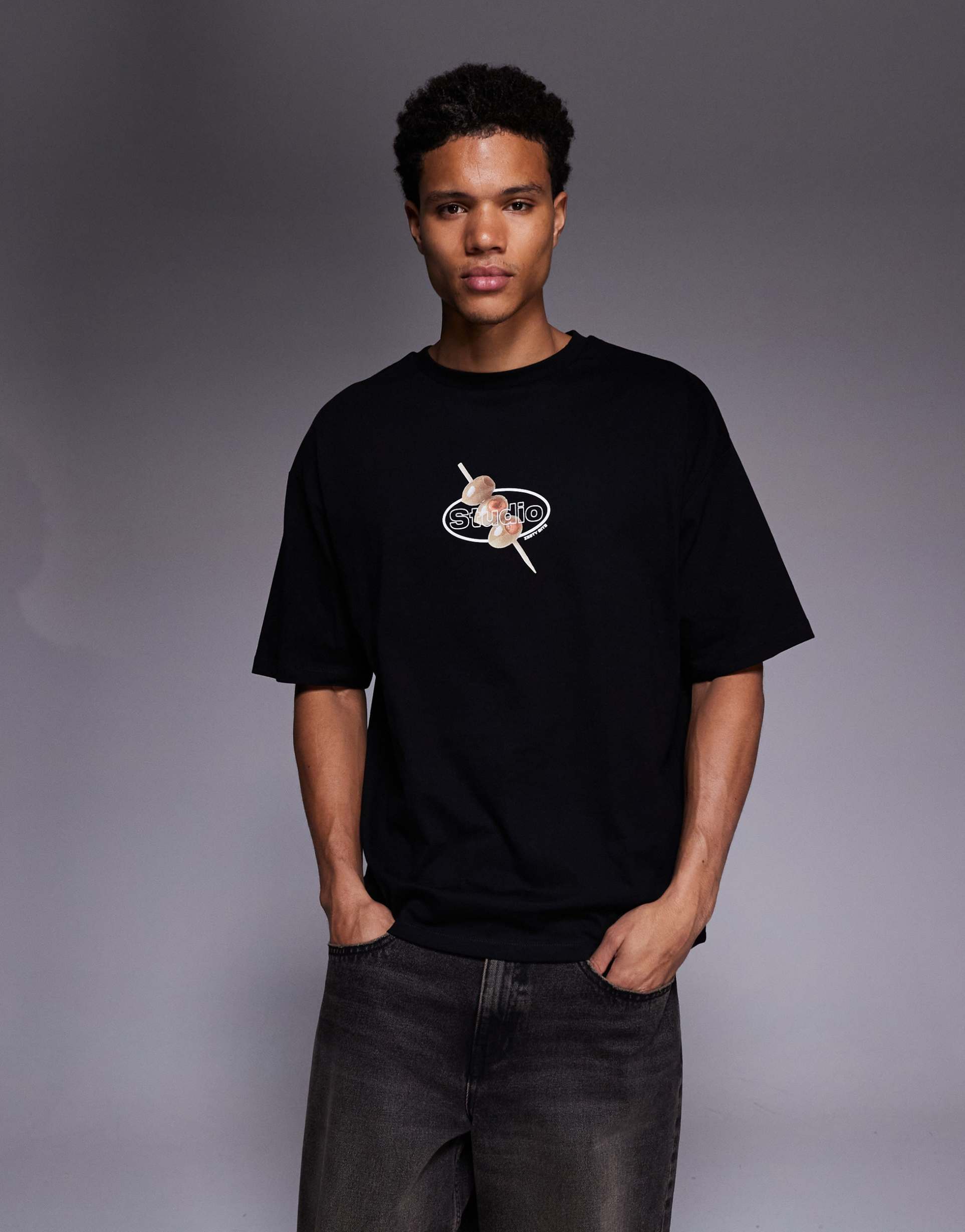 ASOS DESIGN oversized t-shirt with olive graphic in black