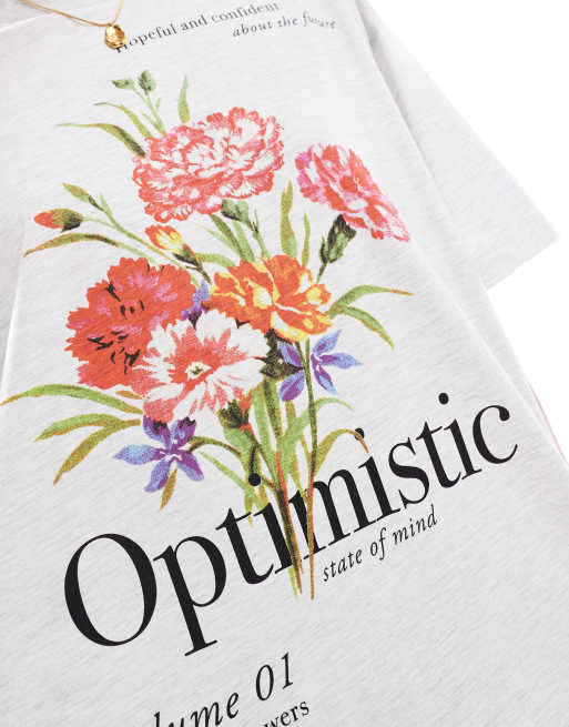 ASOS DESIGN oversized t-shirt with optimistic flower graphic in