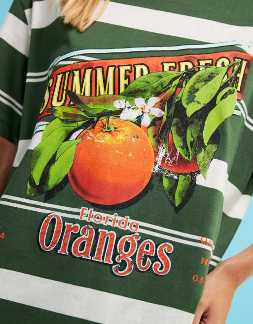 ASOS DESIGN oversized t-shirt with orange fruit graphic in green stripe