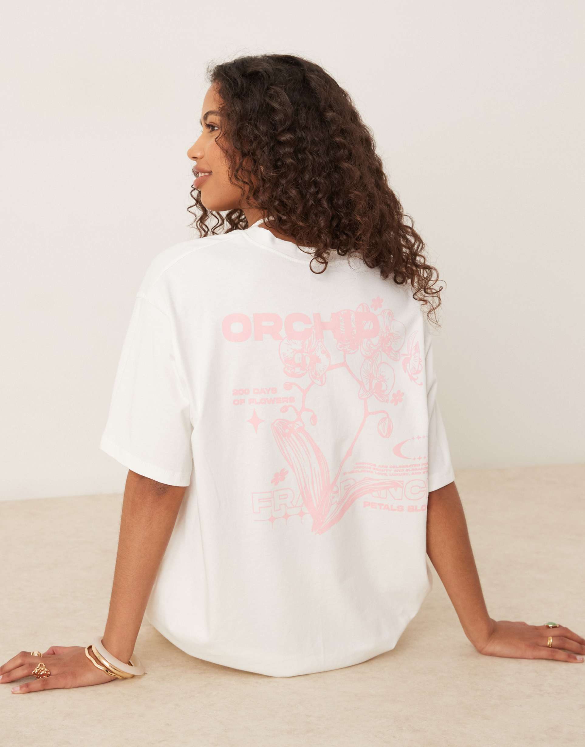 asos design oversized t-shirt with orchid flower back graphic in cream