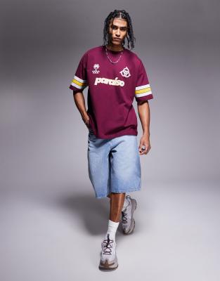ASOS DESIGN oversized t-shirt with paneling and athletic graphic in burgundy