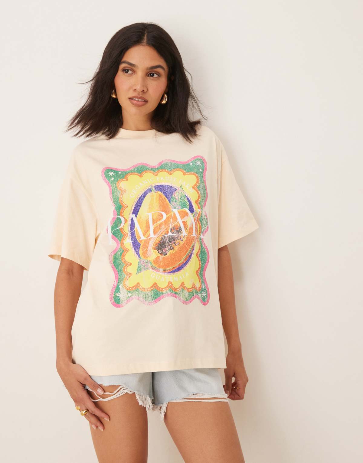 ASOS DESIGN oversized t-shirt with papaya graphic in peach