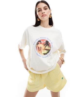 ASOS DESIGN oversized t-shirt with paradise island beer drink graphic in cream-White