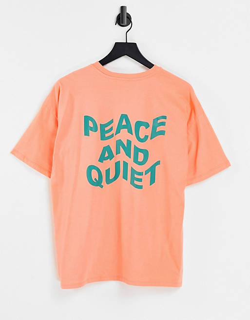 Tops oversized t-shirt with peace and quiet graphic in coral 
