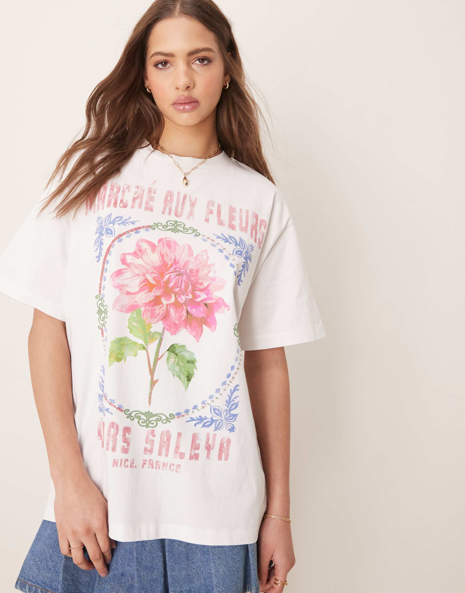 asos design oversized t-shirt with pink flower graphic in coconut milk