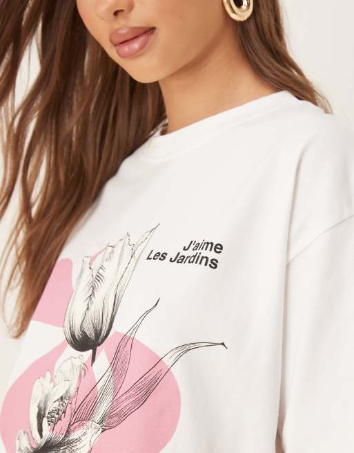 ASOS DESIGN oversized T-shirt with pink flower graphic in white