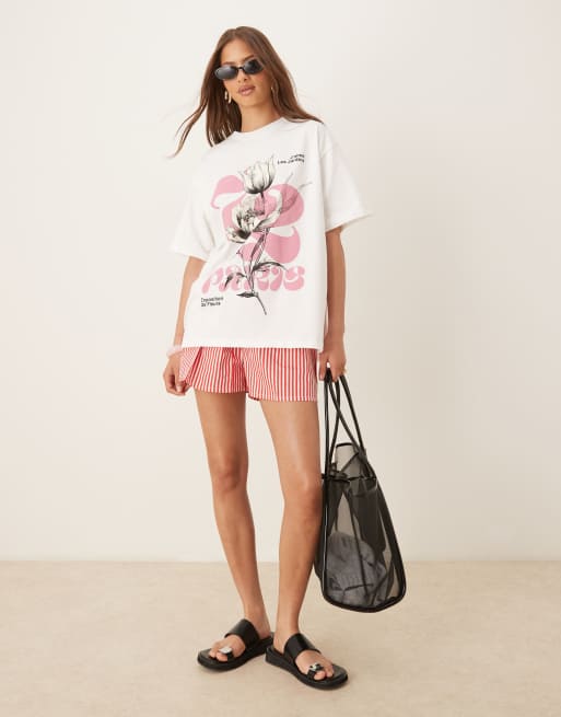 ASOS DESIGN oversized T-shirt with pink flower graphic in white