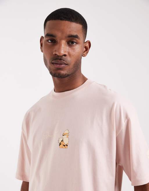 ASOS DESIGN oversized T-shirt with Pokemon Growlithe print in Pink, 5 of 5
