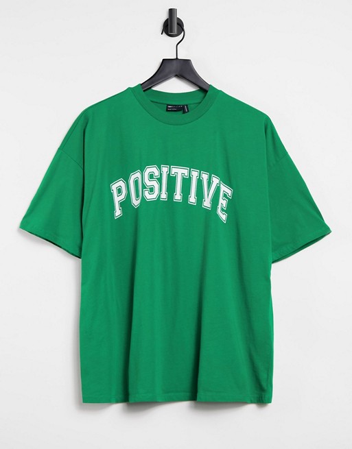 ASOS DESIGN oversized t-shirt with positive motif in green