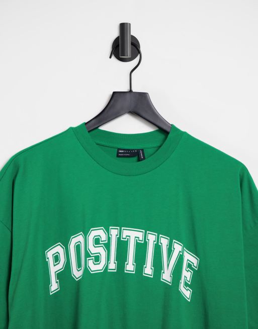 ASOS DESIGN oversized t-shirt with positive motif in green