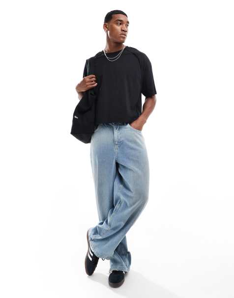 ASOS DESIGN oversized t-shirt with raw seam detail in black - view 1