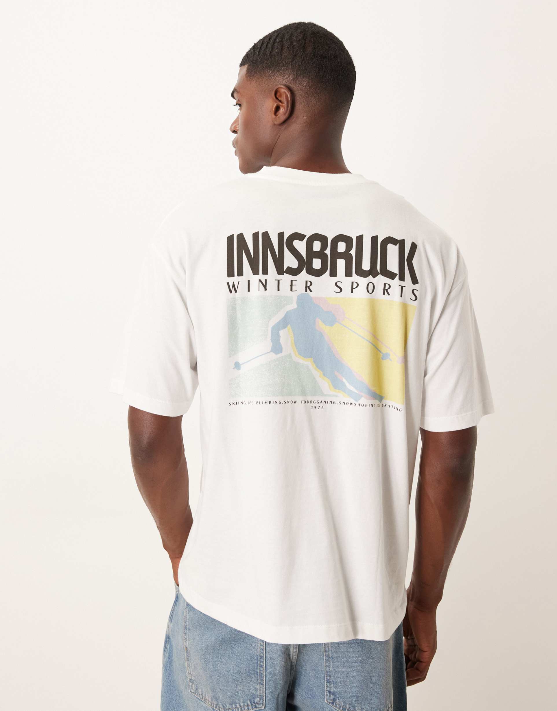 ASOS DESIGN oversized t-shirt with ski sports graphic in white