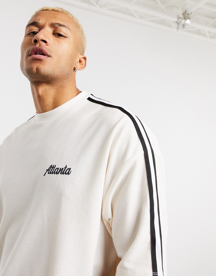 ASOS DESIGN oversized t-shirt with sleeve taping and small chest city embroidery in off whtie heavyweight waffle-White
