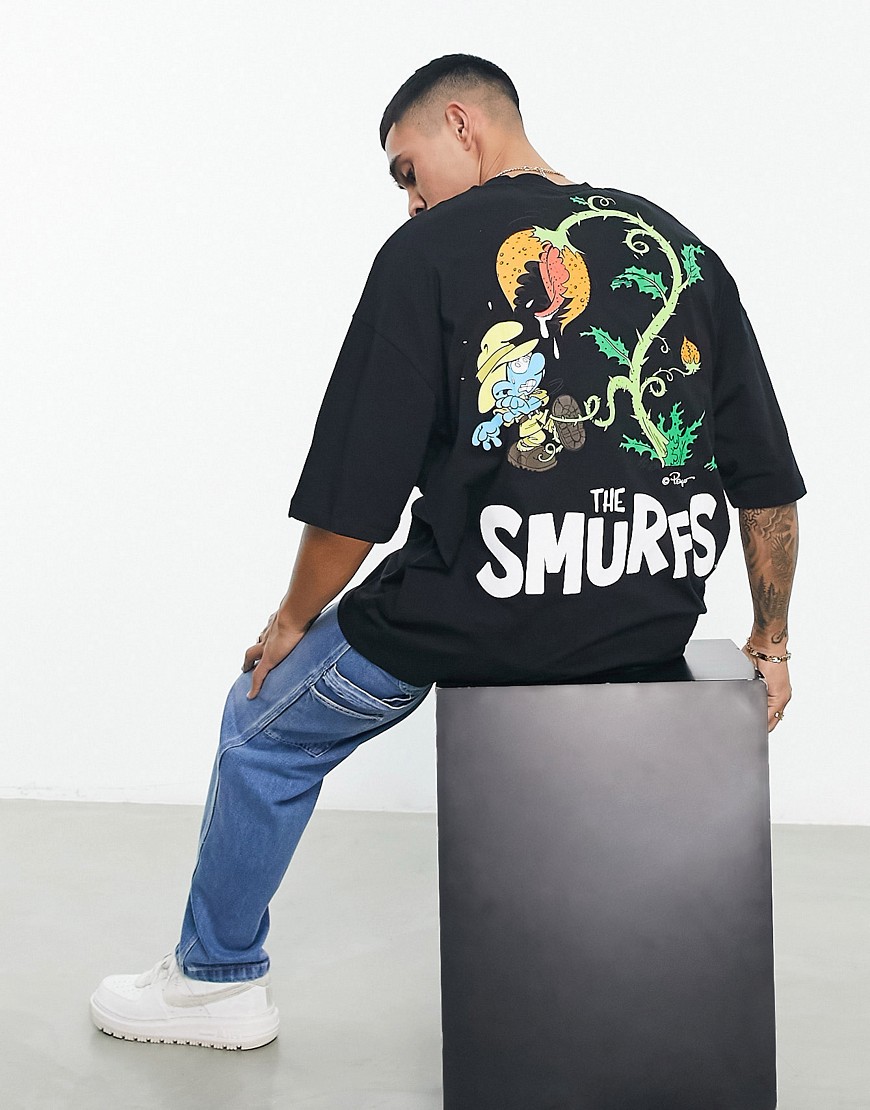 ASOS DESIGN oversized T-shirt with Smurfs print in black