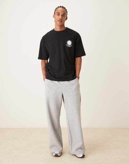 ASOS DESIGN oversized T-shirt with Solare Studio graphic in black, 2 of 5