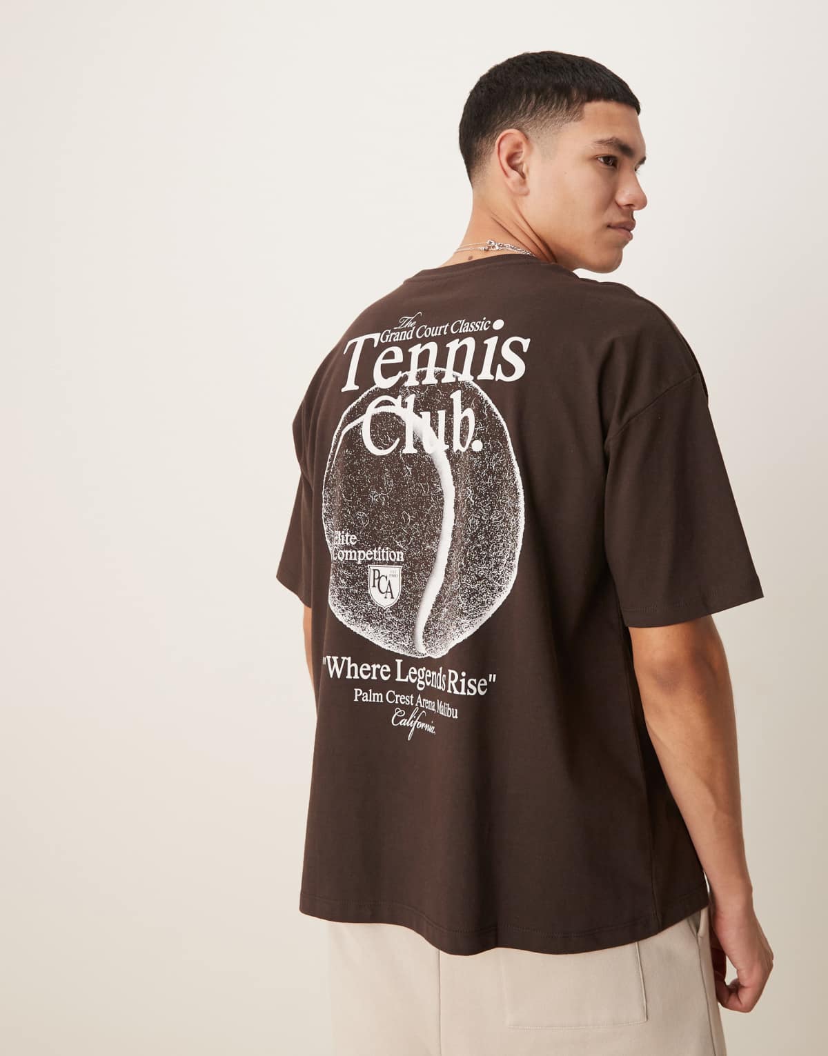 ASOS DESIGN oversized t-shirt with sport graphic in brown