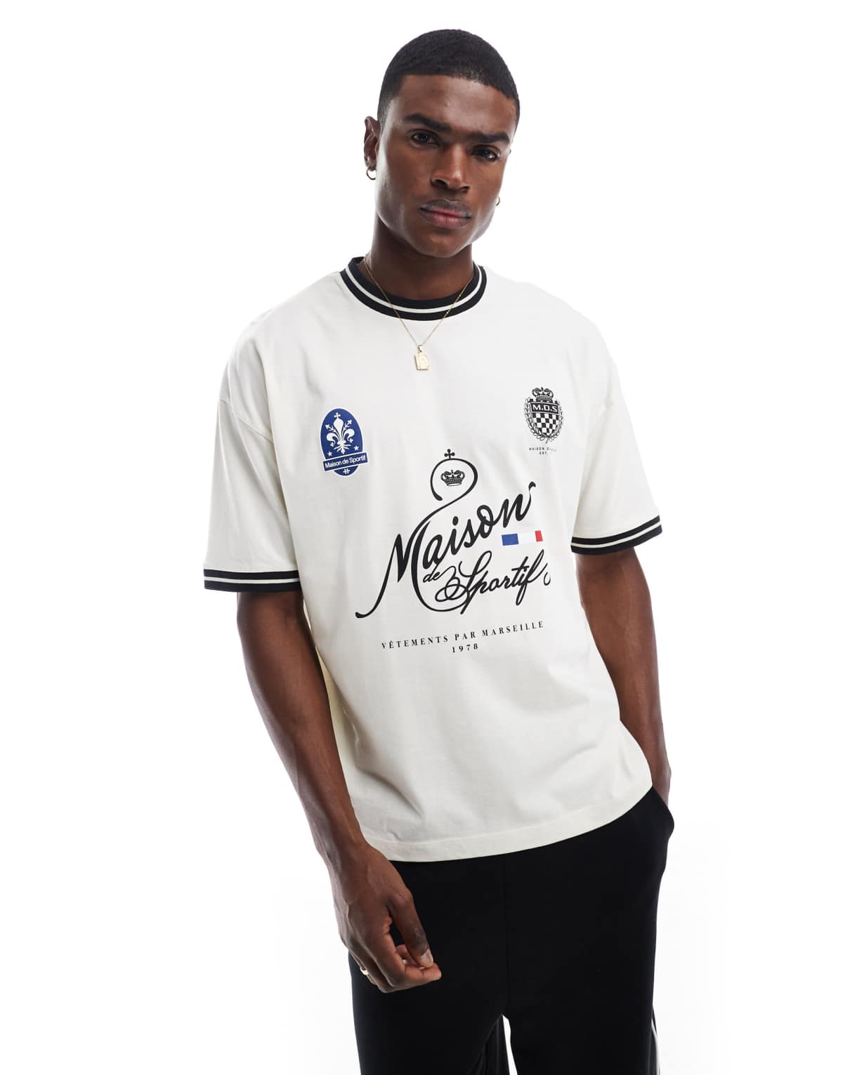ASOS DESIGN oversized t-shirt with sports front print in off-white