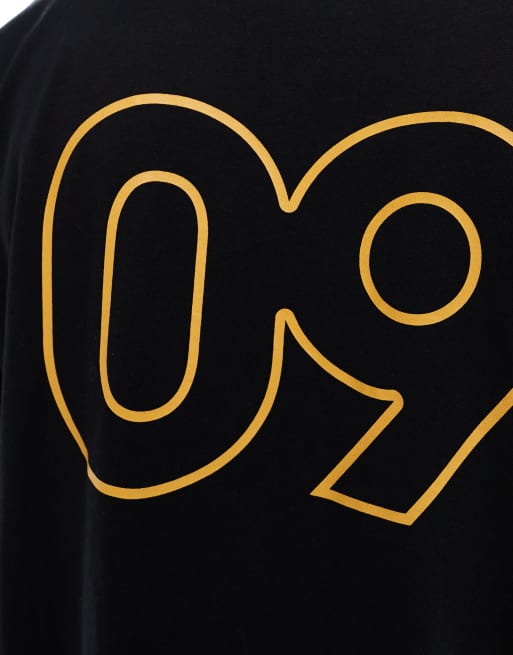 ASOS DESIGN oversized t-shirt with sports graphic in black, 4 of 4