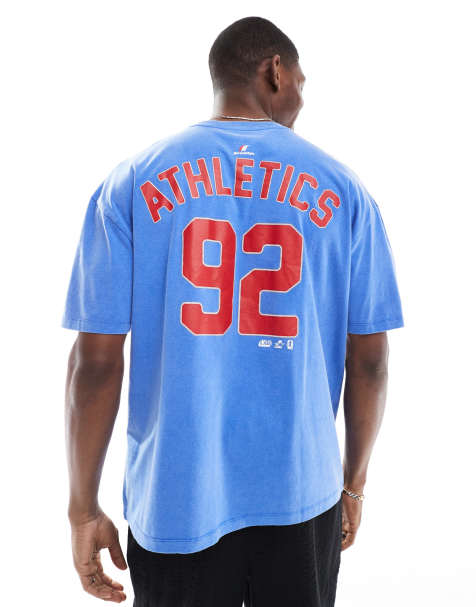 ASOS DESIGN oversized t-shirt with sports graphic in washed blue - view 1