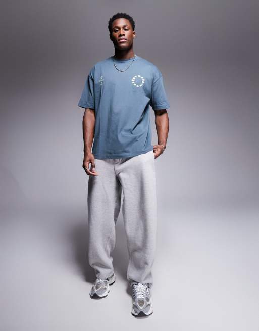 ASOS DESIGN oversized T-shirt with sports graphics in charcoal