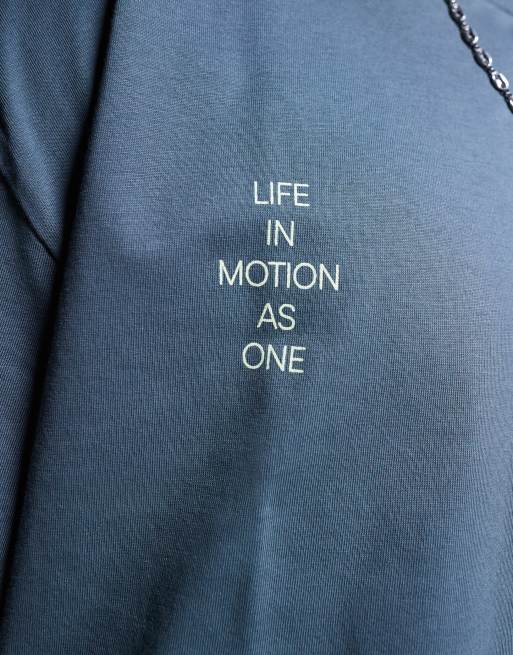 ASOS DESIGN oversized T-shirt with sports graphics in charcoal