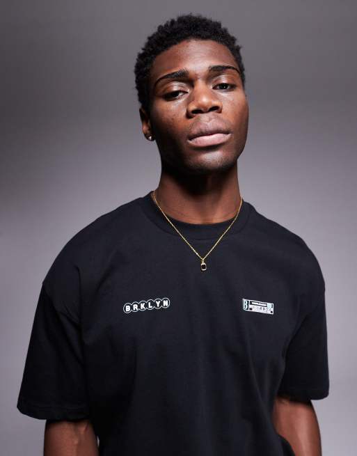 ASOS DESIGN oversized t-shirt with street graphic in black