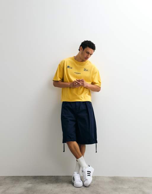 ASOS DESIGN oversized T-shirt with street graphic in yellow wash, 3 of 7